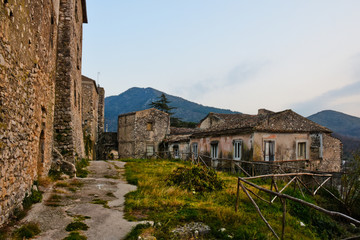 Fototapeta na wymiar Vairano Paterona, Italy, 01/24/2020. Ruined buildings of an abandoned medieval village