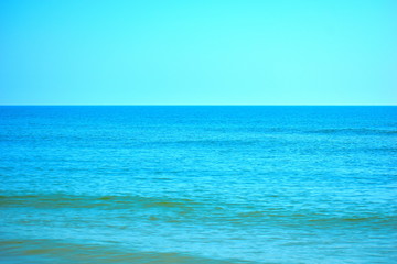 Fototapeta na wymiar marine blue background. A seaside resort in the tropics. Views of the ocean horizon.