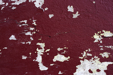 Fototapeta na wymiar Old peeling paint on a concrete wall.
