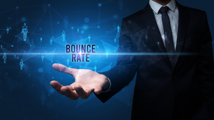 Elegant hand holding BOUNCE RATE inscription, social networking concept