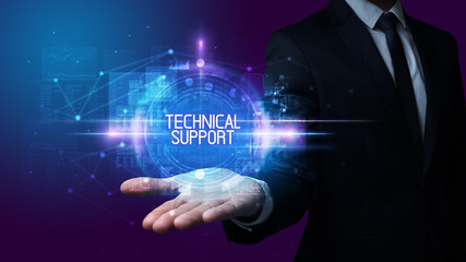 Man hand holding TECHNICAL SUPPORT inscription, technology concept