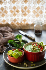 Organic healthy diet food served in front of the window with an openwork curtain