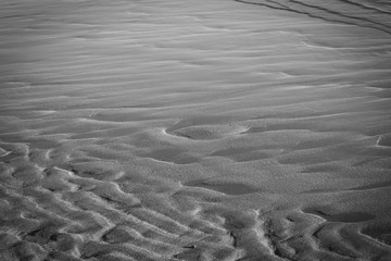 Wavy sand beach in low tide time