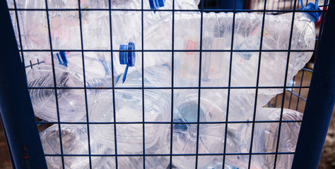 plastic bottle in recycle bin,waste management concept.