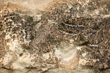 The structure of an old burnt stone. Can be used as background.