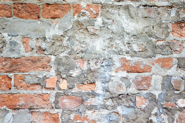 Old brick wall in cement. Can be used as background.