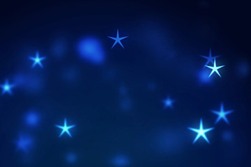 Fototapeta na wymiar Abstract blue Christmas background. Stars bokeh particles and light. New year 2020