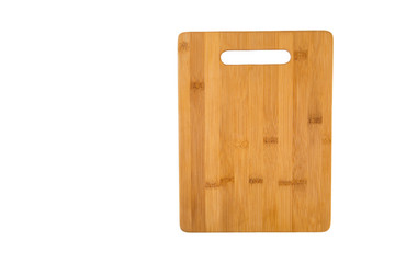 Wooden rectangular cutting Board made of bamboo, isolated on a white background horizontally with free space for text. Kitchen equipment, items.