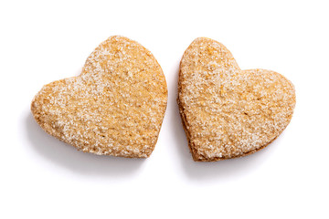 Shortbread cookies in the form of hearts on a white background.