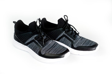 Men's sports shoes dark-colored sneakers with white soles designed for sports and everyday use