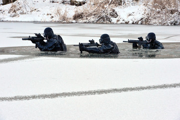 South Korean Army Special Forces infiltration training through the frozen rivers in winter