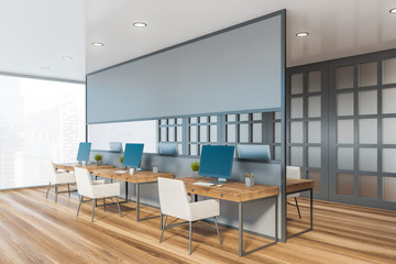 Gray and wooden open space office corner