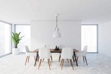 Minimalistic white dining room interior