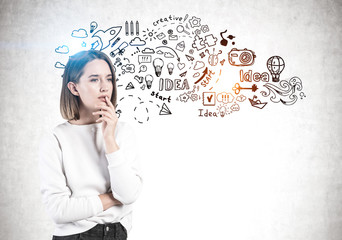 Thoughtful young woman and her creative idea