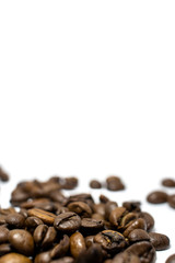 Coffee beans background, roasted coffee beans on a white background, space for text.
