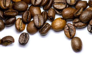 Coffee beans background, roasted coffee beans on a white background, space for text.
