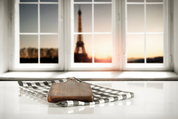 Wooden table of free space for your decoration.Romantic time of Valentine's Day.White wooden window sill with city ladnscape of Paris.Copy space for your product. 