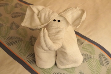 An elephant towel animal for a cute bed decoration