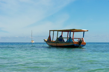 Fototapeta na wymiar An old fishing boat near Labadee, Haiti