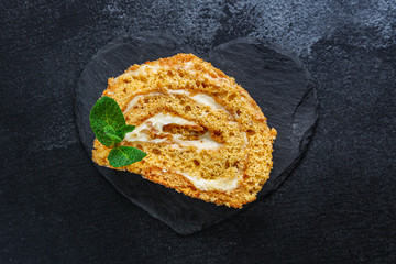 biscuit roll cream and jam (sweet dessert sponge cake) menu concept. background. top view. copy space