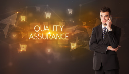 Businessman with shopping cart icons and QUALITY ASSURANCE inscription, online shopping concept