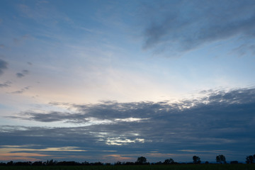Panorama of evenning cloudy sky.