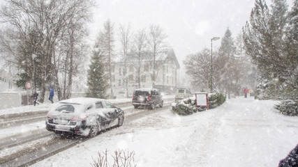 Fototapeta premium extreme snowfall with cars coverd with a lot of snow in Europe, Slovakia, mountain district