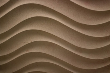 waves as abstract texture for wallpaper or background in brown