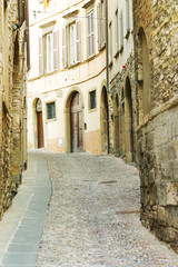 Fototapeta na wymiar the narrow street in old city of Bergamo, Italy