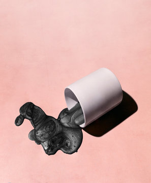 Spilled Cup with Black Liquid