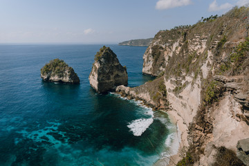The most beautiful beach with white sand and azure water in Bali. Scenic view of Diamond Beach in Nusa Penida, Indonesia