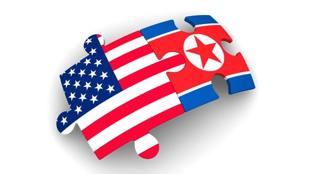 Cooperation between the United States and North Korea. Puzzles with flags of the US and North Korea comes together. The concept of coincidence of interests in geopolitics. Footage video