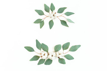Wreath frame made of branches eucalyptus and cotton isolated on white background. lay flat, top view
