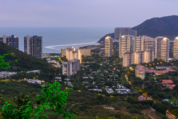 Fototapeta premium Evening view of Banshan Peninsula (Banshan Bandao), Xiao Donghai Beach from Luhuitou Mountain Park, Sanya, Hainan, China