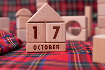 October 17 written with wooden blocks
