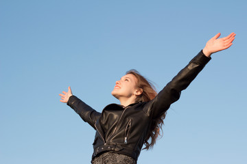 happy girl with hands up