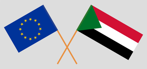 Crossed flags of Sudan and the EU