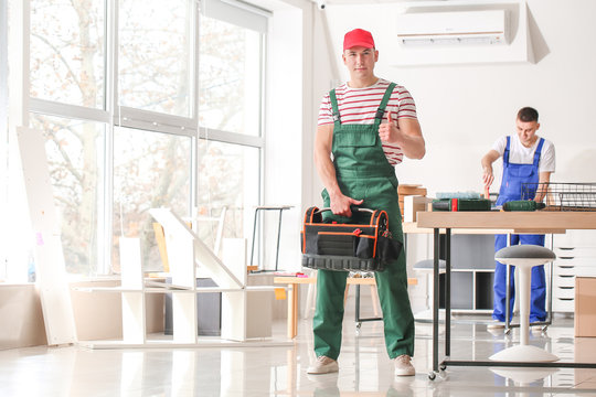 Portrait of furniture assembler in workshop