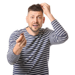 Naklejka premium Man with hair loss problem on white background