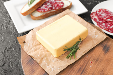 Fresh butter on wooden board, closeup