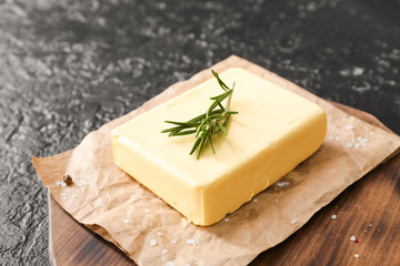 Fresh butter on wooden board, closeup