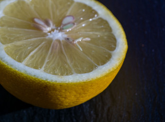 close up of a half yellow lemon
