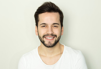Obraz premium Handsome smiling man with white teeth