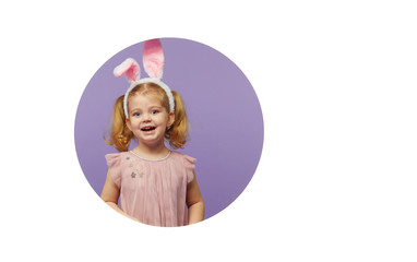 Easter card. Cute little child girl with bunny ears holding basket of Easter eggs. Child in a round hole circle in colored purple and white background. Mockup and copy space for text