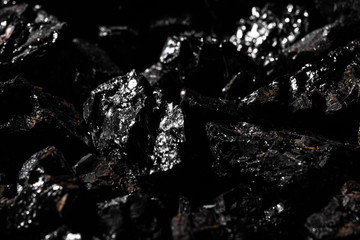 Black charcoal texture, natural mineral resource background