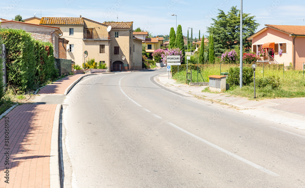 Wall mural A paved road in Porcari town, Province of Lucca, Tuscany, Italy