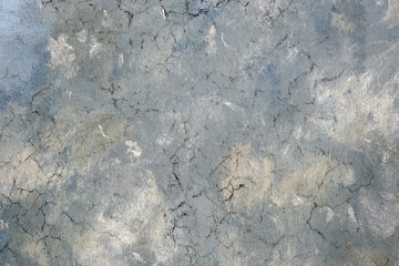 Weathered old grey cracked background with rough surface.