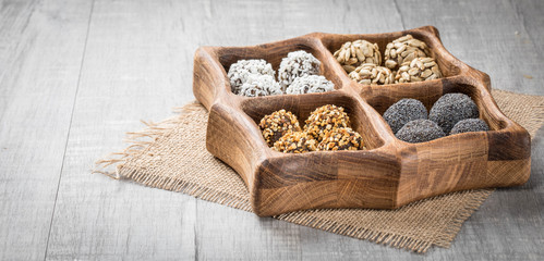 Energy protein balls with healthy ingredients. Home made with dried apricots, dates, plum, almonds,...