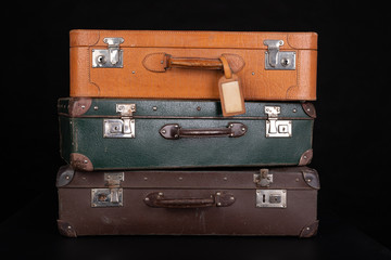 Old destroyed suitcases. Trunks used during long journeys.
