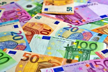 United country's payment system - euro money cash background, pile of paper euro banknotes.